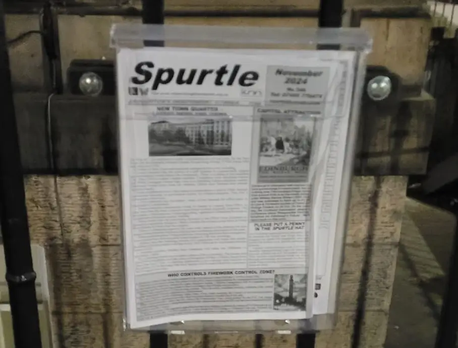 Picture of Broughton Spurtle box on railings.